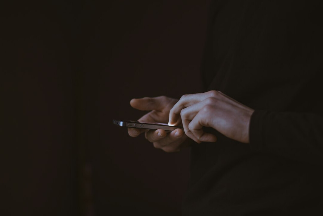 person using phone mindfully