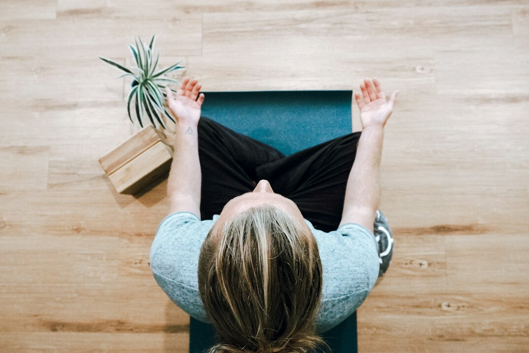 person meditating for focus