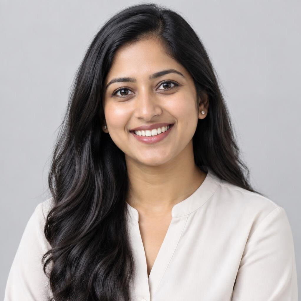 Studio portrait of a South Asian woman smiling